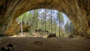 Ash Cave in Hocking Hills with waterfall in background